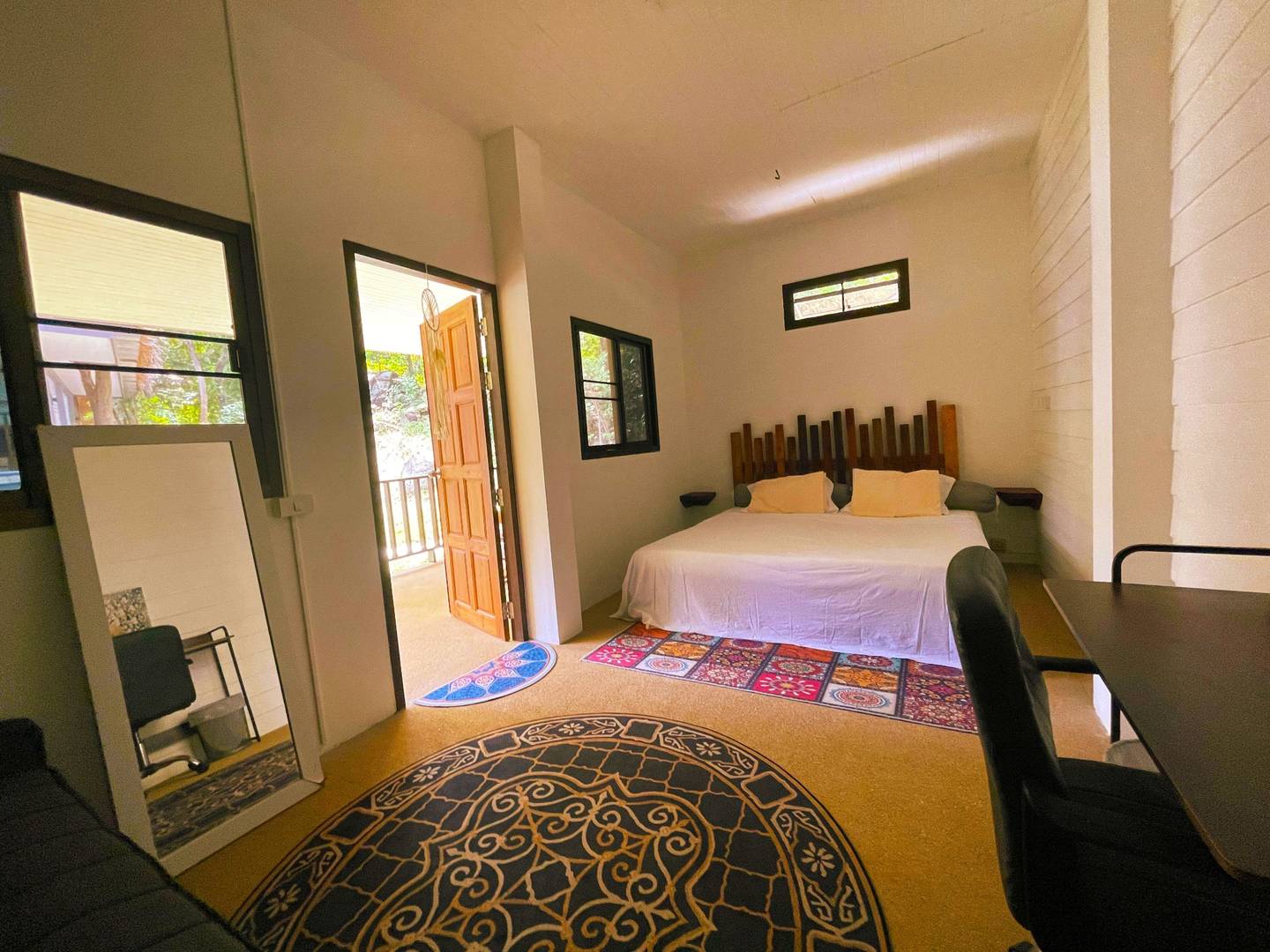 Interior of the Floater's Room guestroom – Canopy Village