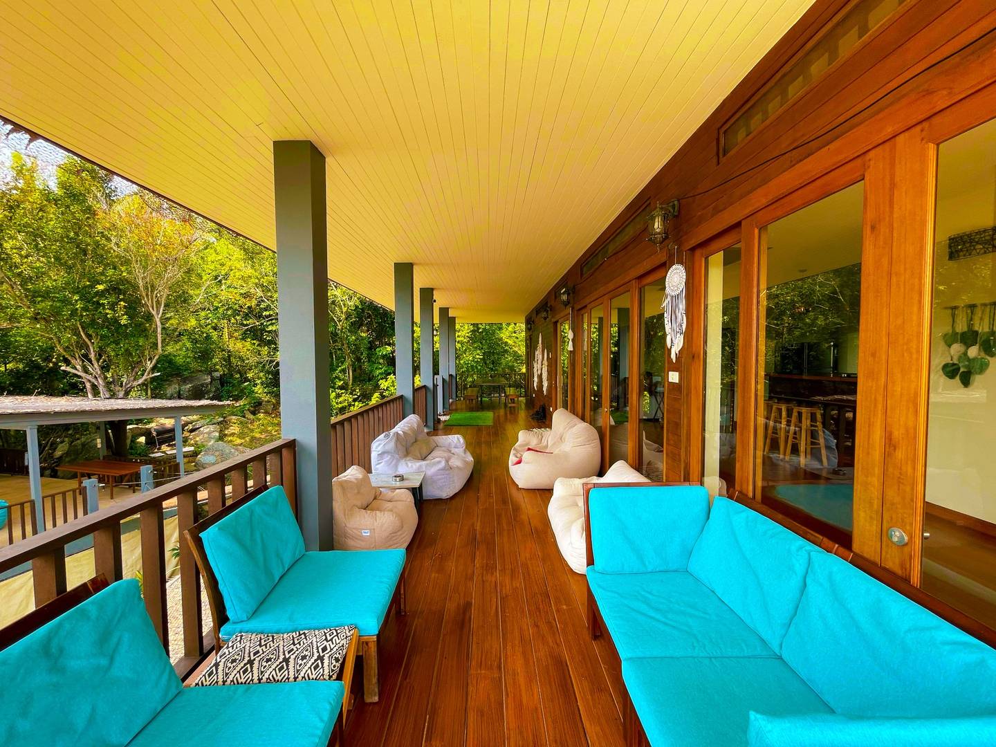 Sea-view terrace with outdoor seating – Canopy Residence