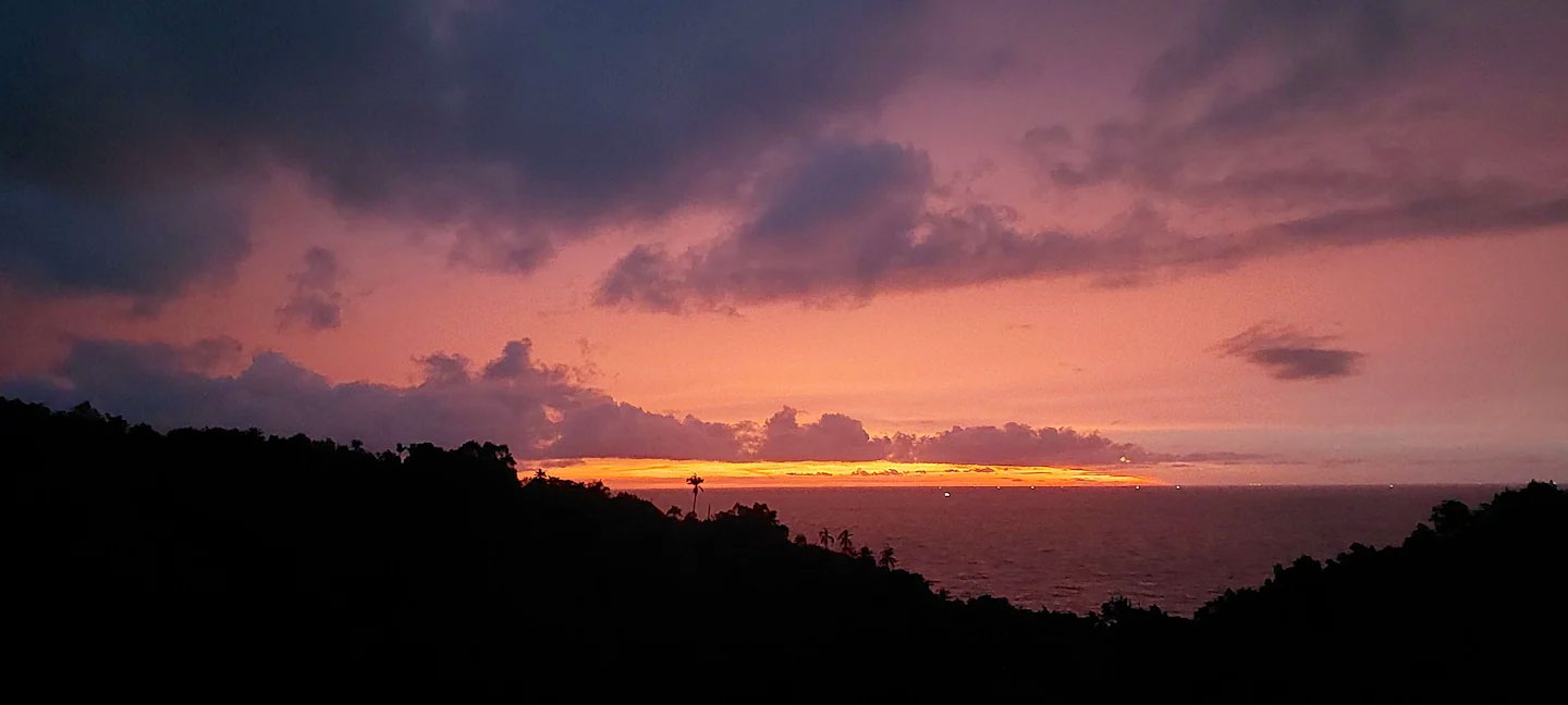 Sunrise over the jungle from villa’s deck – Canopy Sea View Jungle Villa